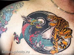 фото тату тигр и дракон 07.12.2018 №016 - tattoo tiger and dragon - tattoo-photo.ru